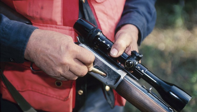 Man loading a rifle