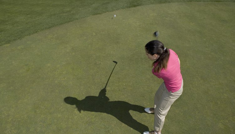 High angle view of a young woman playing golf