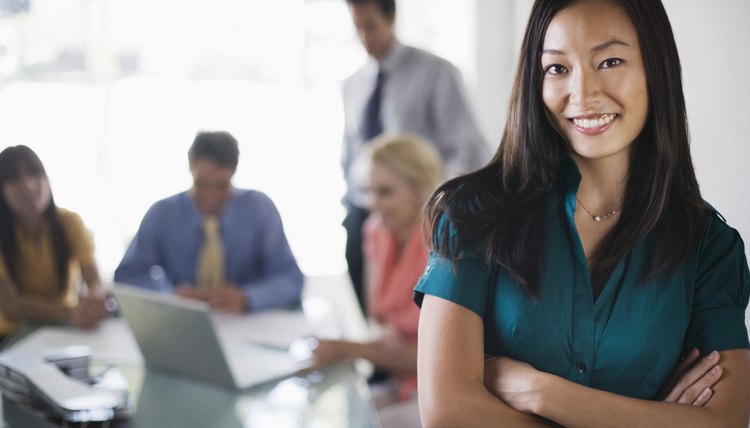 Smiling businesswoman at meeting