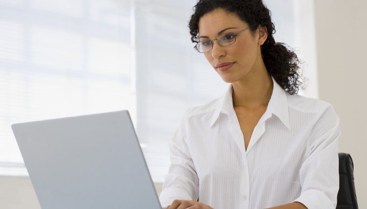 Businesswoman using laptop computer