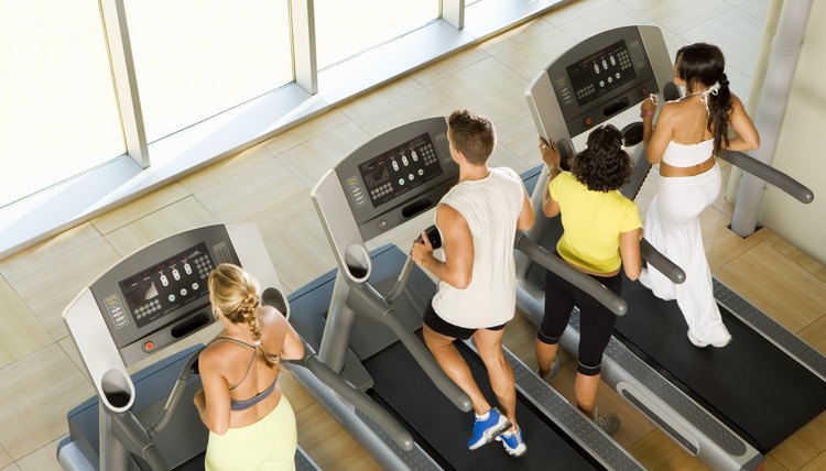 People using treadmills