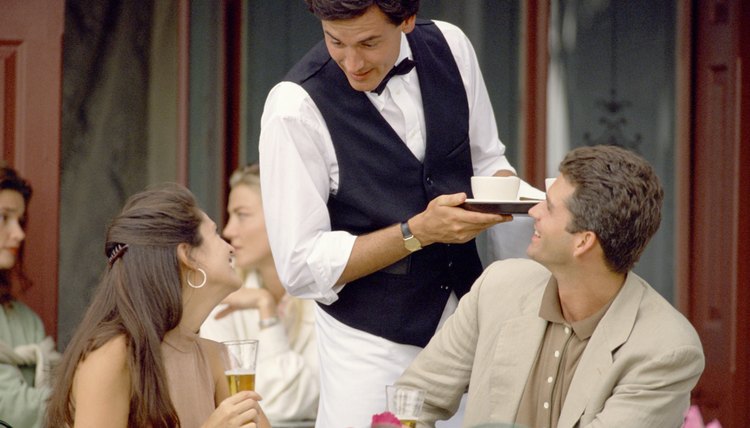 Waiter taking order