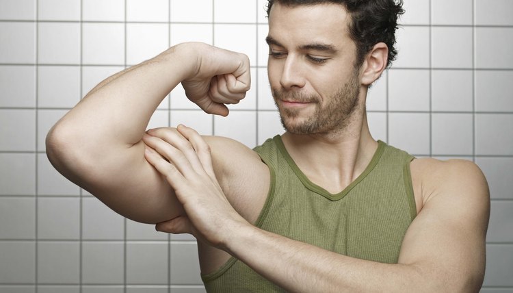 Man flexing bicep