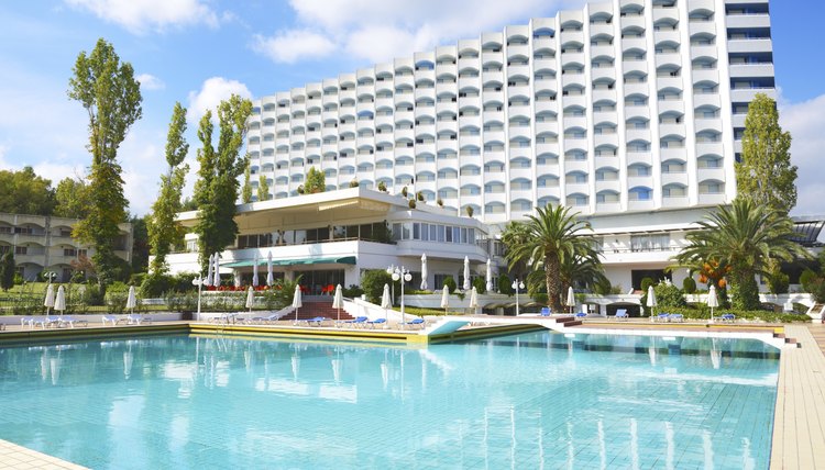 Swimming pool and building of luxury hotel, Halkidiki, Greece