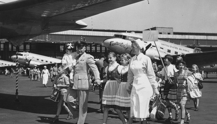 Children are flown out of West Berlin to West Germany on November 16, 1958.