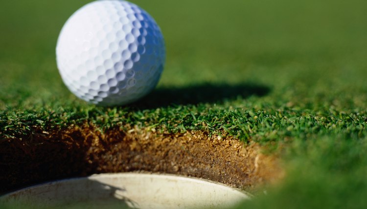 Golf Ball on the Edge of a Hole