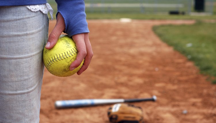 Teenage Girl and Her Softball, Glove, Bat