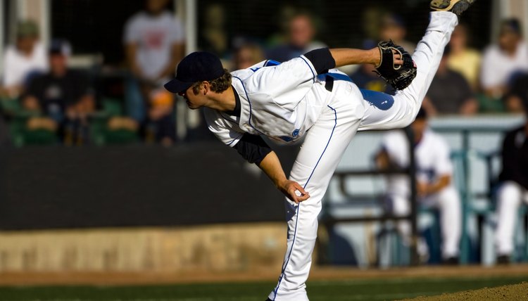 A baseball playing throwing the ball