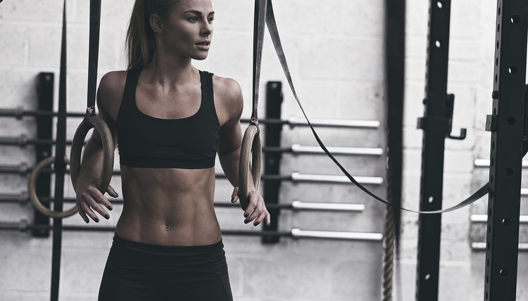 Female athlete training in the gym.