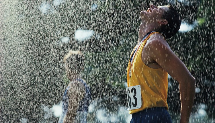 Man cooling off after running race