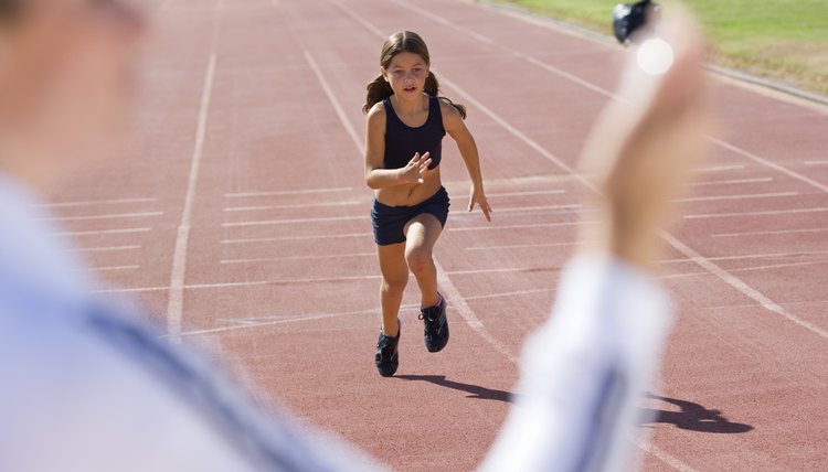 Girl running timed sprint