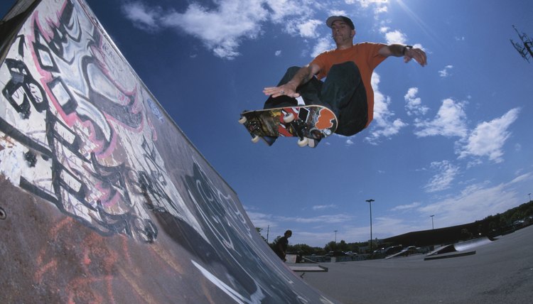 Skateboarding using ramp at skate park