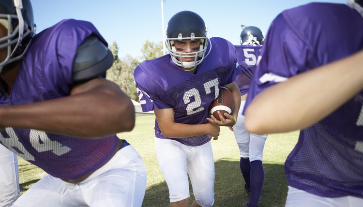 Running Back behind Linemen