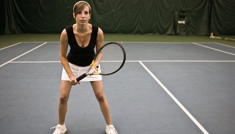 Woman tennis player in ready stance