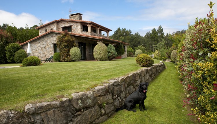 Wide shot of an idyllic cottage in the Italian countryside