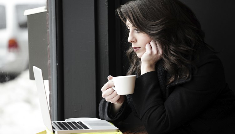 Woman studying on laptop