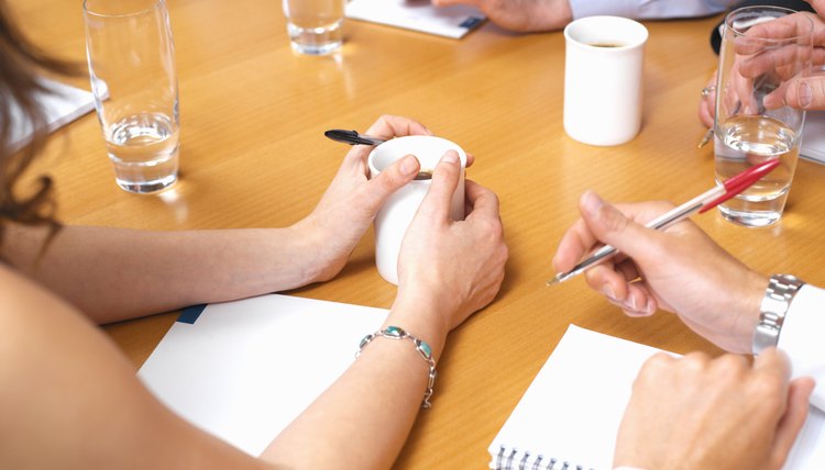 Close-up of meeting table during chair meeting.