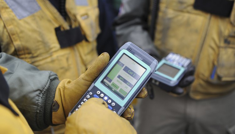 Team of military personal receiving communication