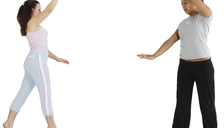 Teachers use verbal cues to help visually-impaired students participate.