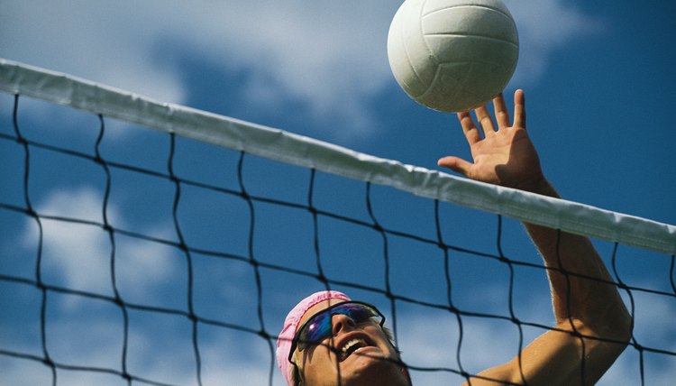 Man playing beach volleyball