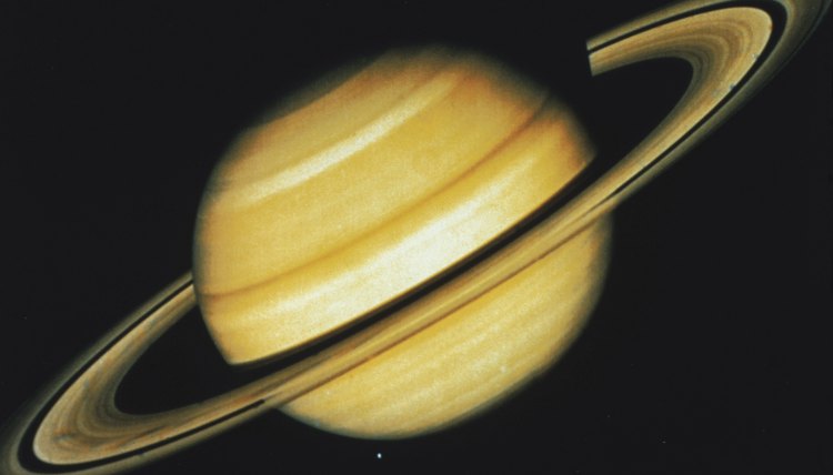 You must have high-powered binoculars or a telescope to see Saturn's rings.
