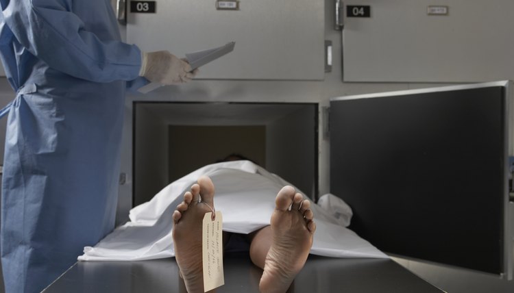 A licensed embalmer replaces the blood in the deceased's body with embalming fluid.