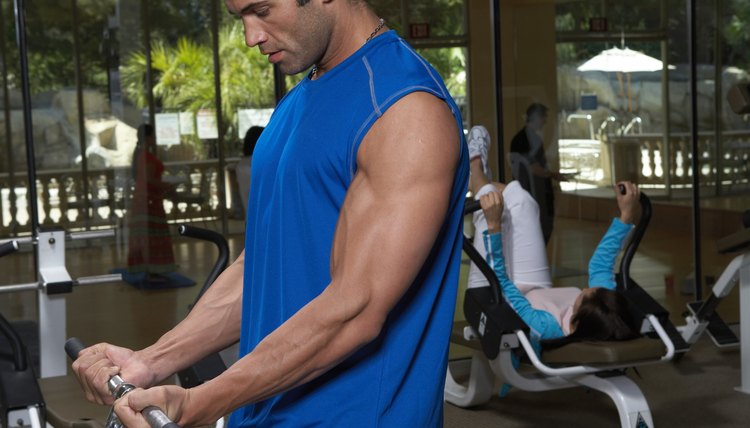 Man doing exercise in gym, close-up