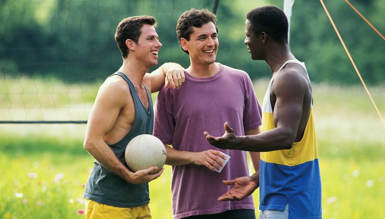 Men playing volleyball