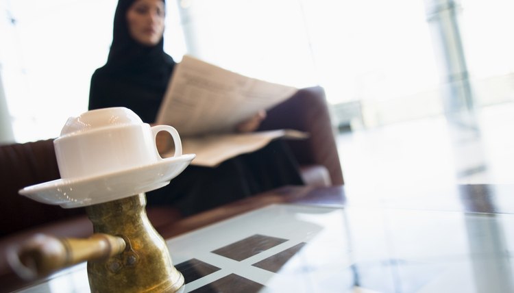 Women in Saudi Arabia typically dress in full-length abayas.