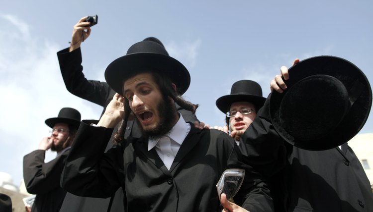 Orthodox Jews believe in a strict interpretation of their religion's traditional laws.