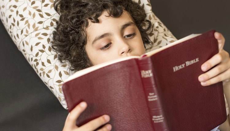 Child reading from the Bible