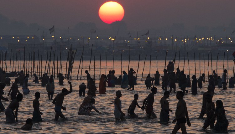 Hindu devotees bathe during what is believed to be the world's largest religious gathering.