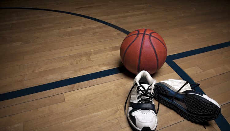 What Is the Difference Between Tennis Shoes & Basketball Shoes?