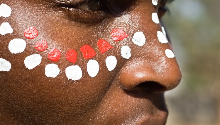 Close-up African man with painted face.