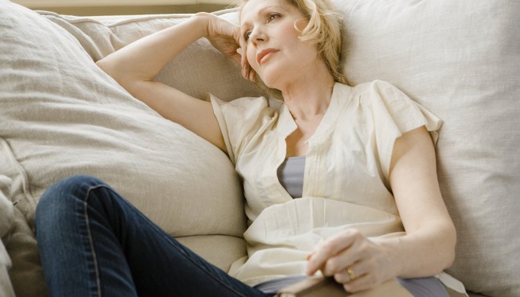 Woman thinking while relaxing.