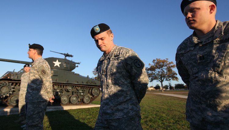 U.S. Army Major (2nd-R) and Captain