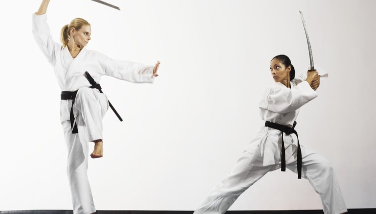 Women fighting with katana swords