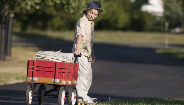 Boy delivering newspapers