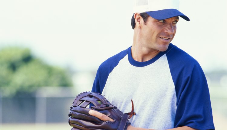 Baseball player looking away, smiling