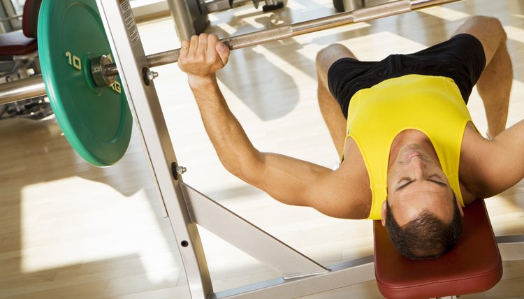 Man using bench press