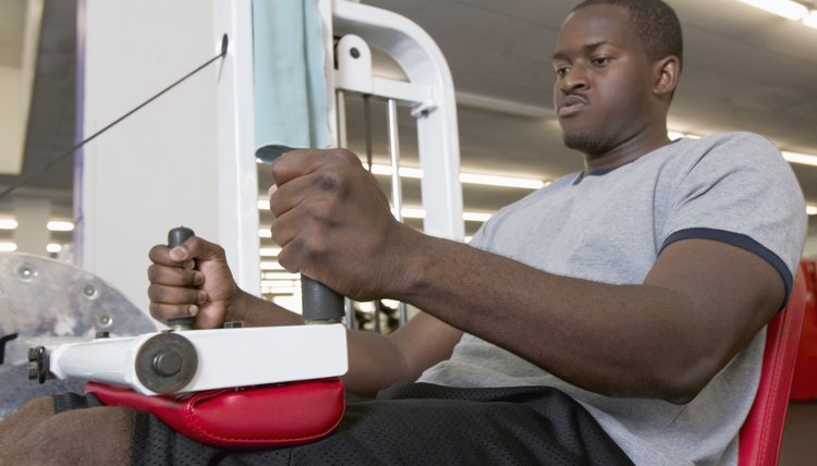 Man using weight machine