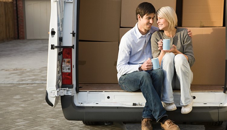 Couple in removal van