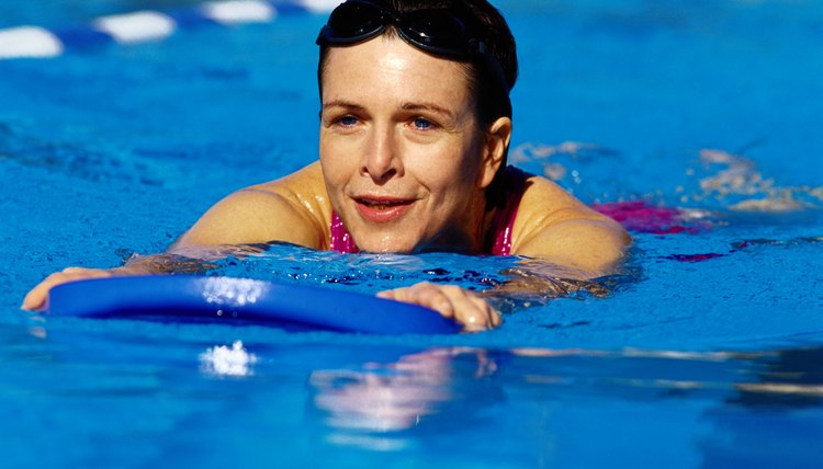 Swimmer Using Buoyancy Aid in Pool
