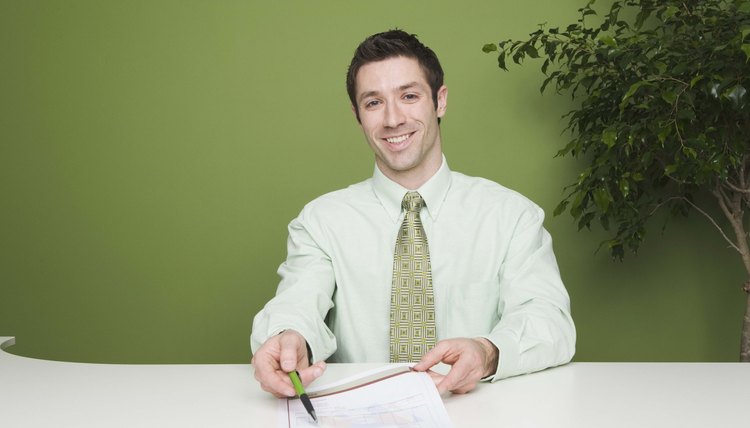 Businessman with pen and document