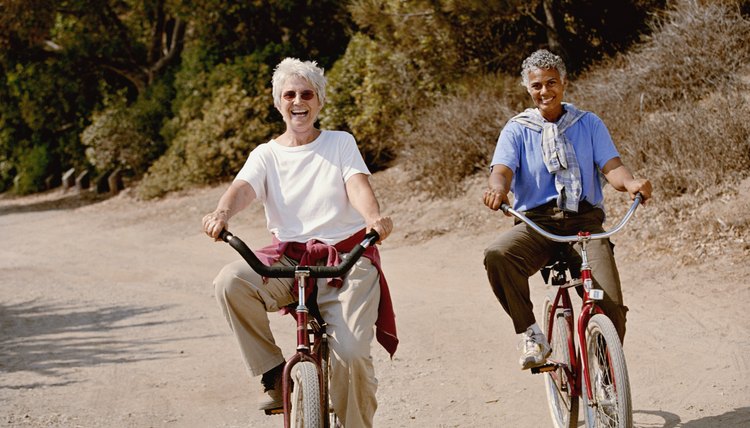 Multi-ethnic senior women riding bicycles