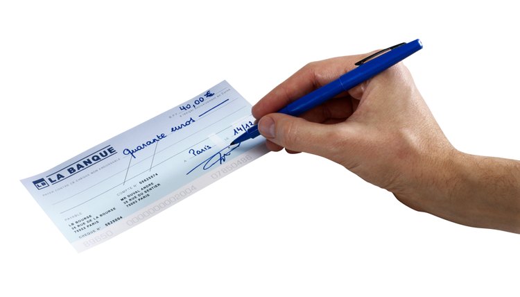 Man Signing a Euro Bank Check