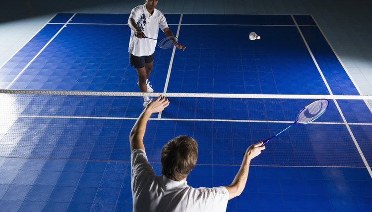 Men playing badminton