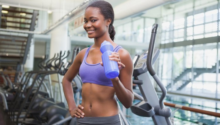 Fit woman smiling at camera