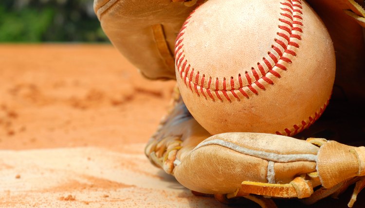 Closeup of Old Baseball and Glove