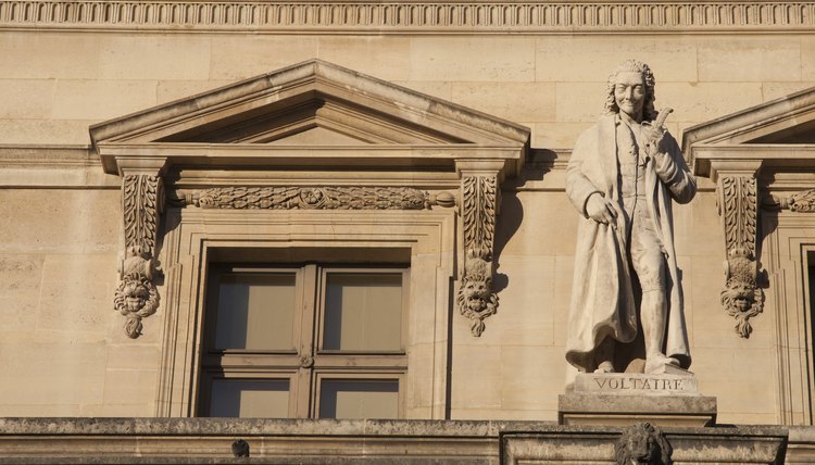 Statie of Voltaire at the Louvre.